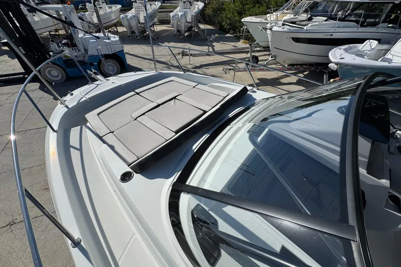 Slide: The Image of 2026 Jeanneau Leader 9.0 WA Series 2 boat with sunpad, docked outdoors. - 44