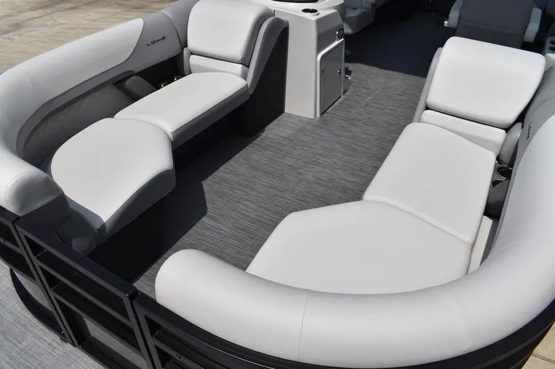 Slide: The Image of 2026 Lowe SS 230 WT Special pontoon boat interior with gray seating and flooring. - 12