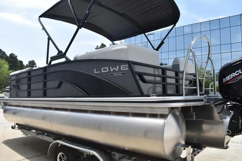 Slide: The Image of 2026 Lowe SS 230 WT Special pontoon boat with canopy and Mercury engine. - 13