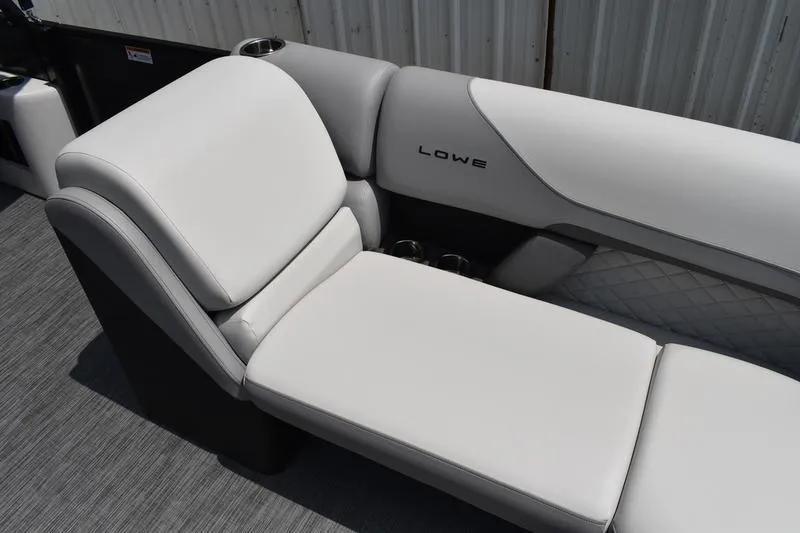 Slide: The Image of 2026 Lowe SS 230 WT Special boat interior with sleek white seating. - 15