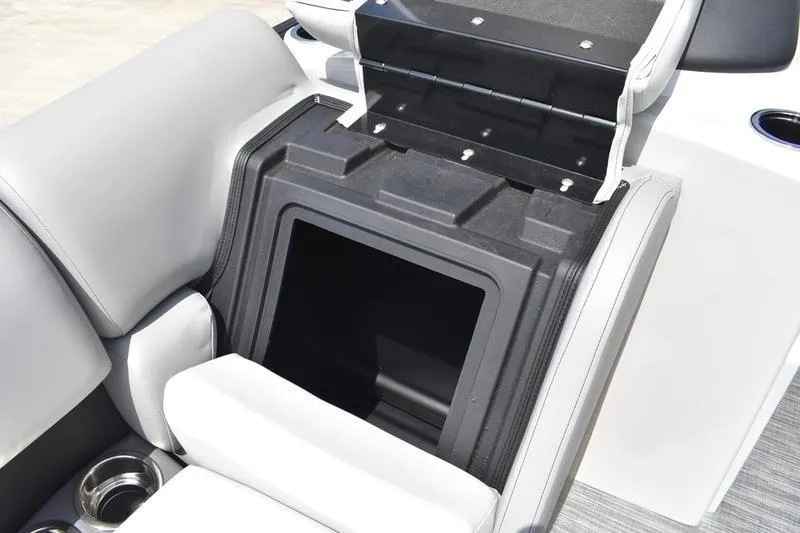 Slide: The Image of Open storage compartment on 2026 Lowe SS 230 WT Special boat seat. - 17