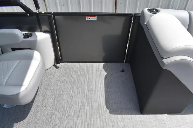 Slide: The Image of Interior of 2026 Lowe SS 230 WT Special boat with gray seating and flooring. - 23