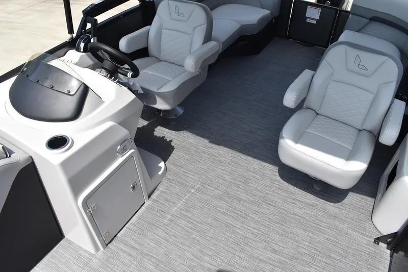 Slide: The Image of Interior of 2026 Lowe SS 230 WT Special boat with modern seating and helm. - 25