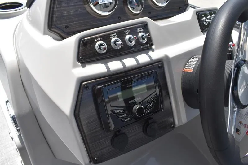 Slide: The Image of Dashboard of 2026 Lowe SS 230 WT Special boat with controls and stereo system. - 27