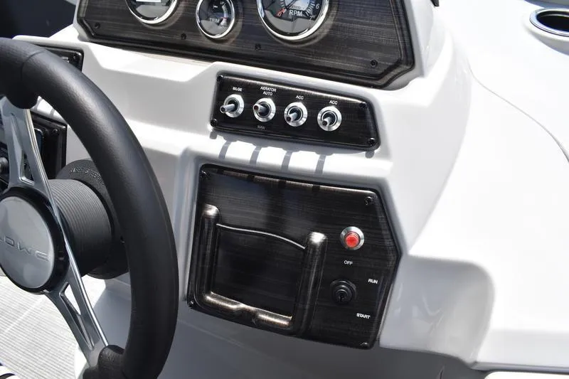 Slide: The Image of Dashboard of 2026 Lowe SS 230 WT Special boat with steering wheel and controls. - 28