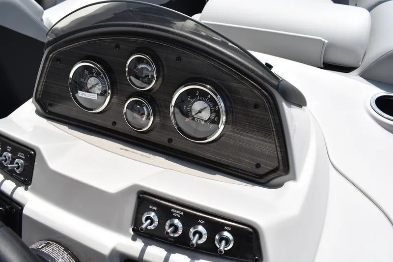 Slide: The Image of Dashboard of 2026 Lowe SS 230 WT Special boat with gauges and controls. - 29