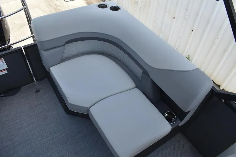 Slide: The Image of 2026 Lowe SS 230 WT Special boat seating with cup holders, featuring gray upholstery. - 34