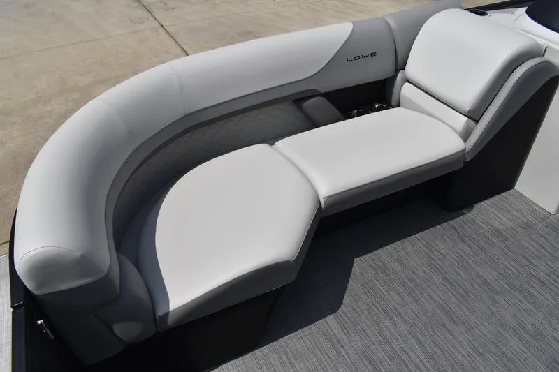 Slide: The Image of Luxurious seating on 2026 Lowe SS 230 WT Special boat, featuring sleek gray upholstery. - 6