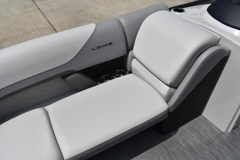 Slide: The Image of 2026 Lowe SS 230 WT Special boat interior with gray cushioned seating. - 7