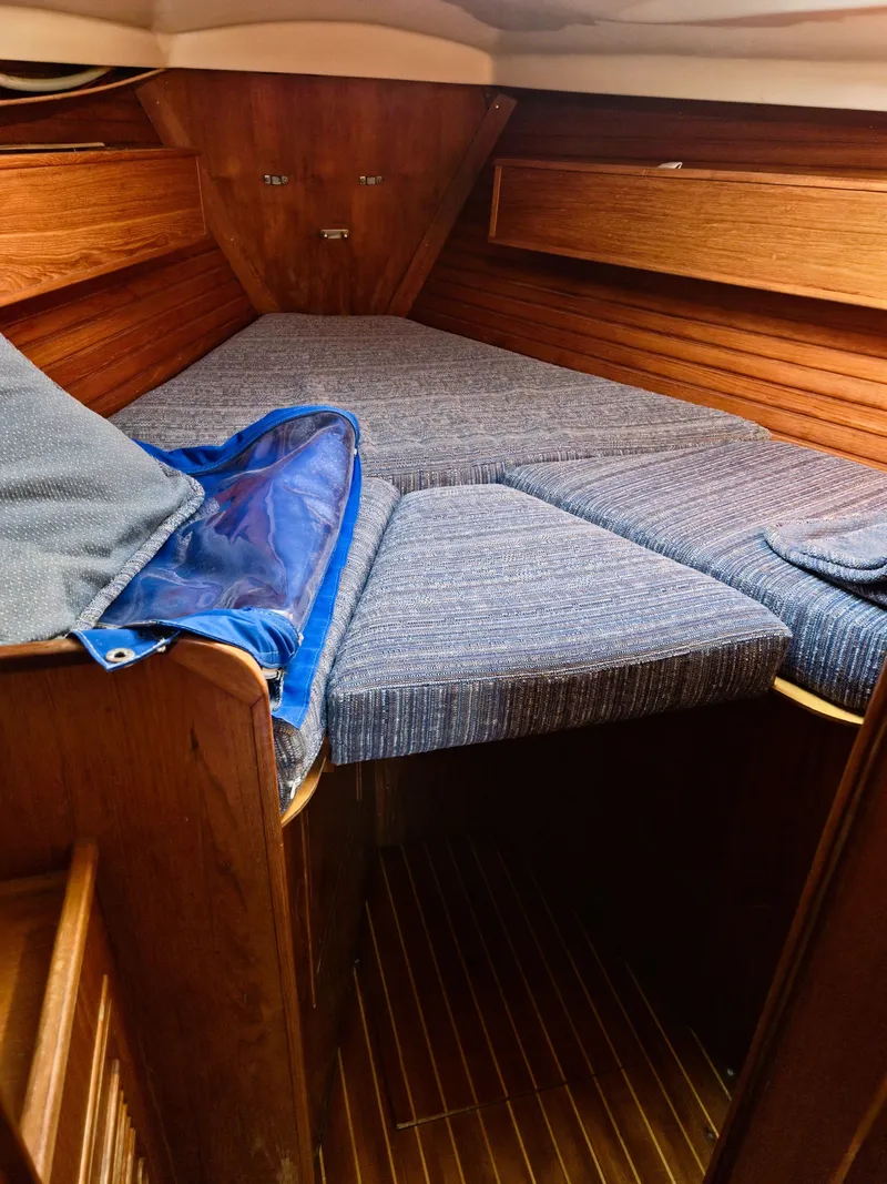 Slide: The Image of Interior of a 1984 Wauquiez Pretorien yacht with wooden finish. - 43