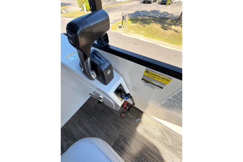 Slide: The Image of Control panel of a 2021 Godfrey 2286 boat with capacity label. - 22