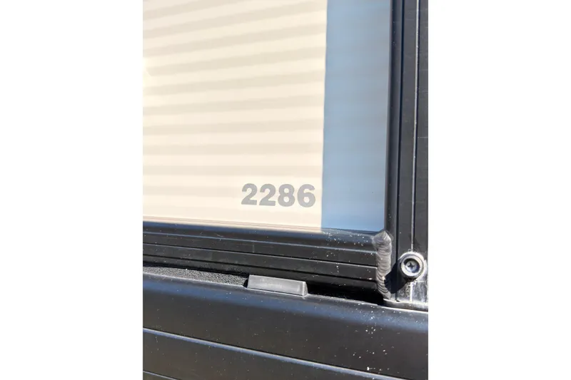 Slide: The Image of Close-up of Godfrey 2286 model number on a 2021 vehicle panel. - 24