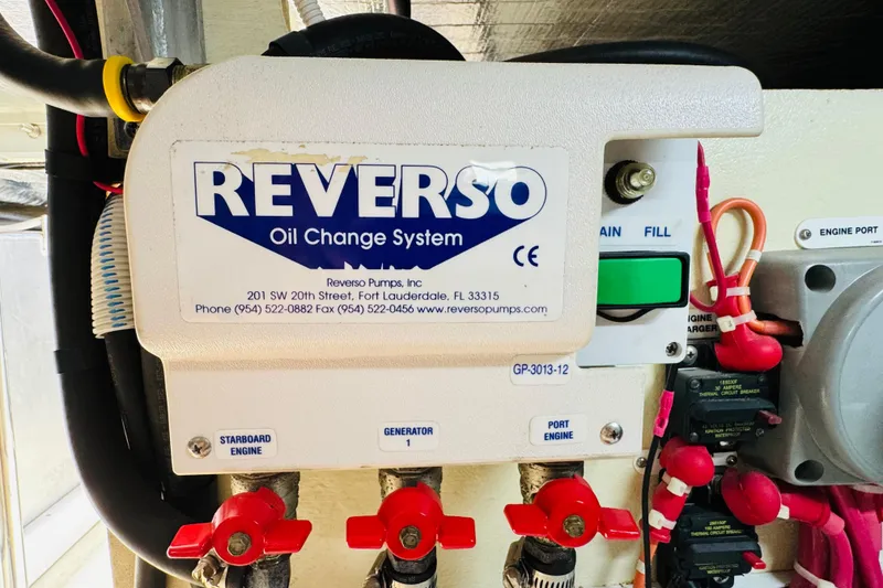 Slide: The Image of Reverso oil change system in 2006 Carver 46 Voyager engine room. - 104
