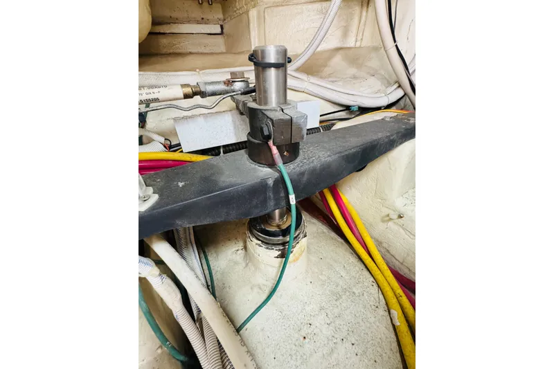 Slide: The Image of Engine compartment of 2006 Carver 46 Voyager with visible wiring and components. - 108
