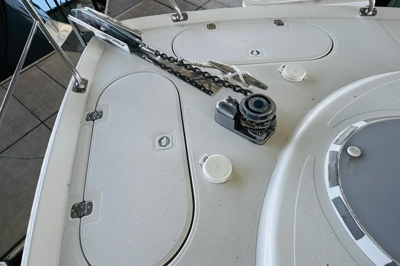 Slide: The Image of Deck of 2006 Carver 46 Voyager yacht with anchor and winch system. - 14