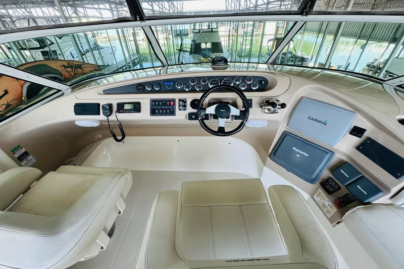 Slide: The Image of Interior helm of 2006 Carver 46 Voyager yacht with modern navigation equipment. - 37