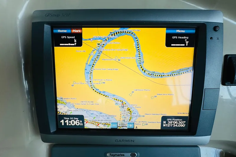 Slide: The Image of GPS navigation screen on a 2006 Carver 46 Voyager boat, showing a detailed waterway map. - 45