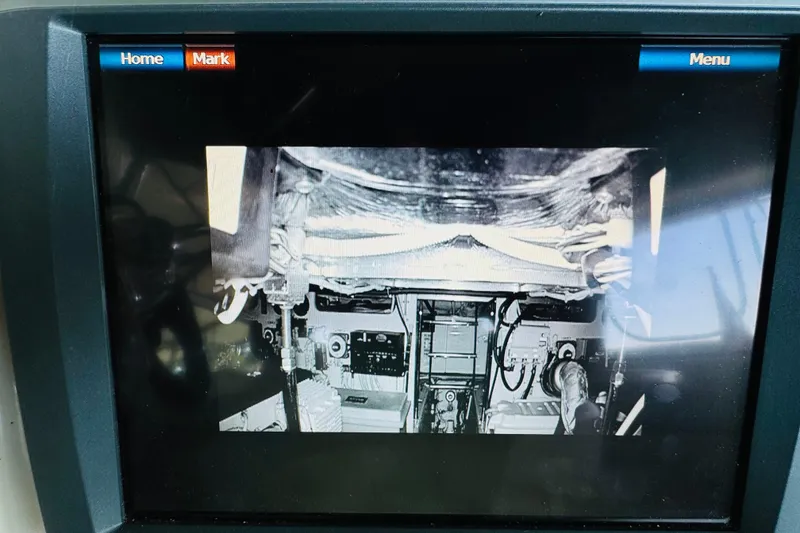 Slide: The Image of Display screen showing engine compartment of 2006 Carver 46 Voyager yacht. - 48