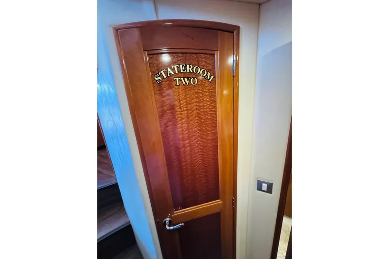 Slide: The Image of Stateroom Two door on 2006 Carver 46 Voyager yacht interior. - 76