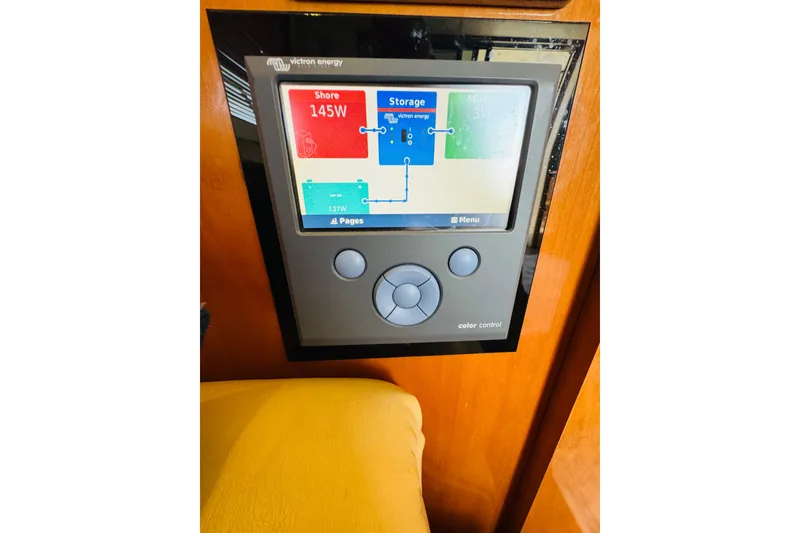 Slide: The Image of Control panel on a 2006 Carver 46 Voyager yacht displaying power usage. - 90