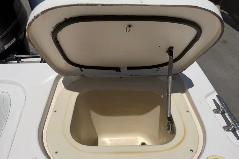 Slide: The Image of Open storage compartment on a 1994 Grady-White Sailfish 272 boat. - 101
