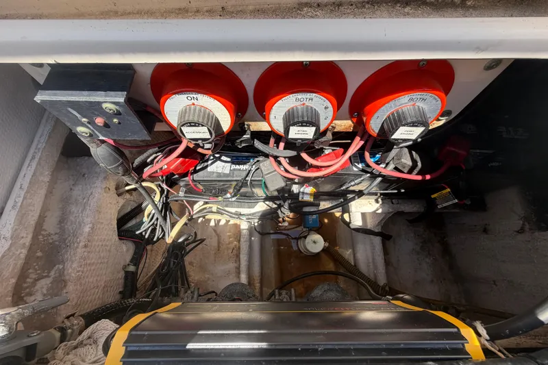 Slide: The Image of Electrical system of a 1994 Grady-White Sailfish 272 boat, featuring battery switches. - 105