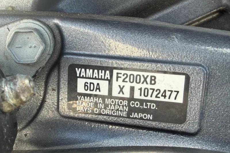 Slide: The Image of Yamaha F200XB engine label on a 1994 Grady-White Sailfish 272 boat. - 111