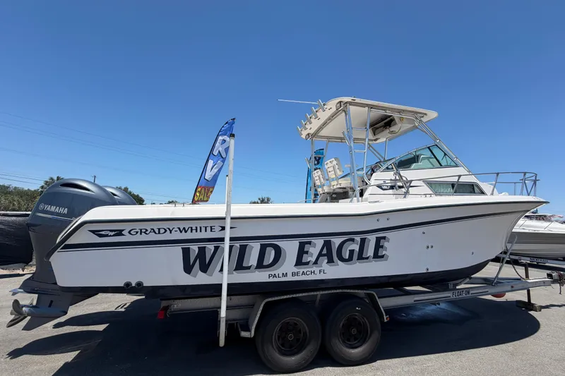 Slide: The Image of 1994 Grady-White Sailfish 272 boat named "Wild Eagle" on trailer in Palm Beach, FL. - 2