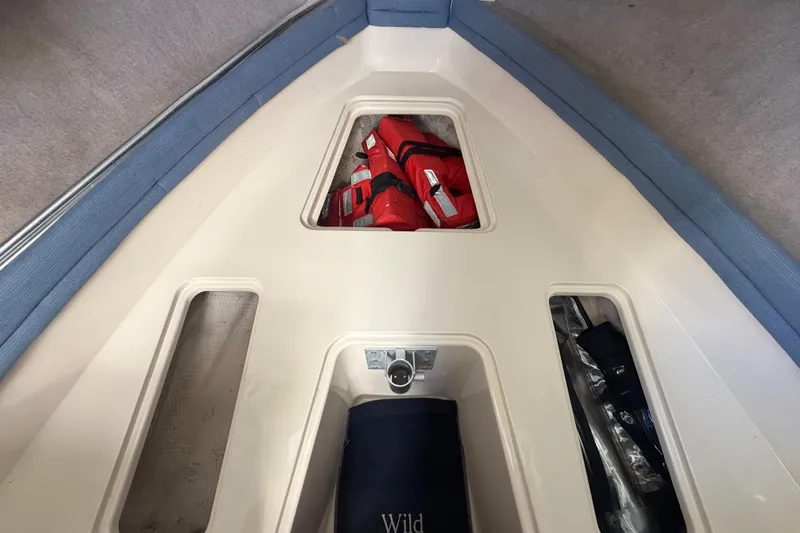 Slide: The Image of Interior of Grady-White Sailfish 272 boat with life jackets. - 45