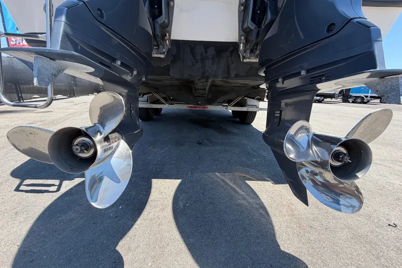 Slide: The Image of Twin propellers of a 1994 Grady-White Sailfish 272 boat on a trailer. - 5