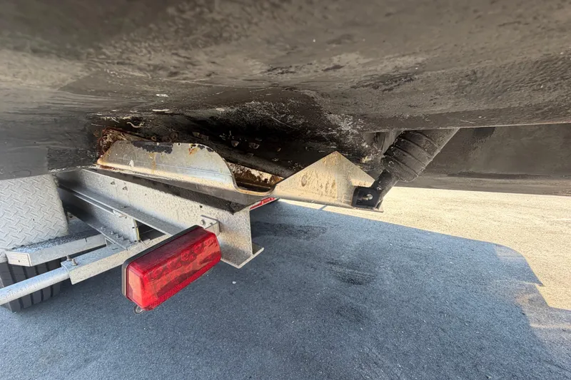 Slide: The Image of Underside view of a 1994 Grady-White Sailfish 272 boat on a trailer. - 6