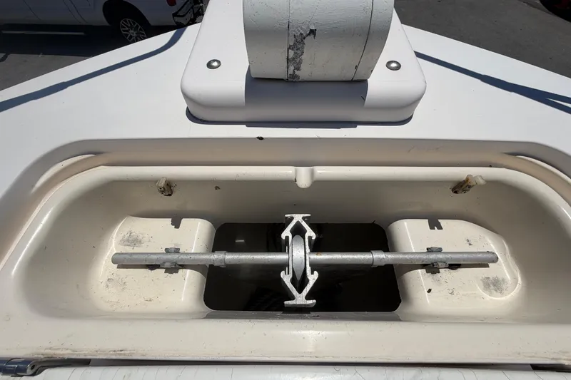Slide: The Image of Anchor locker of a 1994 Grady-White Sailfish 272 boat, showing anchor mechanism. - 87