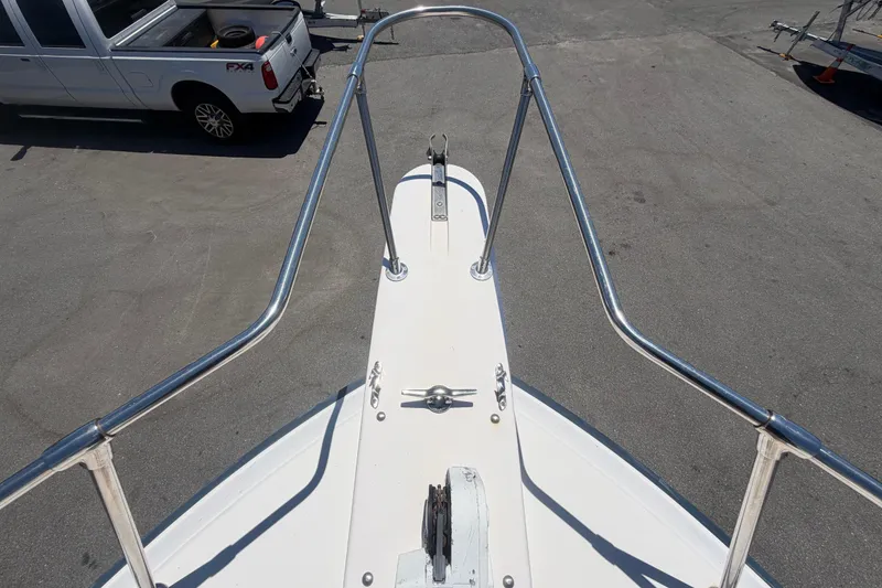 Slide: The Image of Bow view of 1994 Grady-White Sailfish 272 with stainless steel railings. - 89