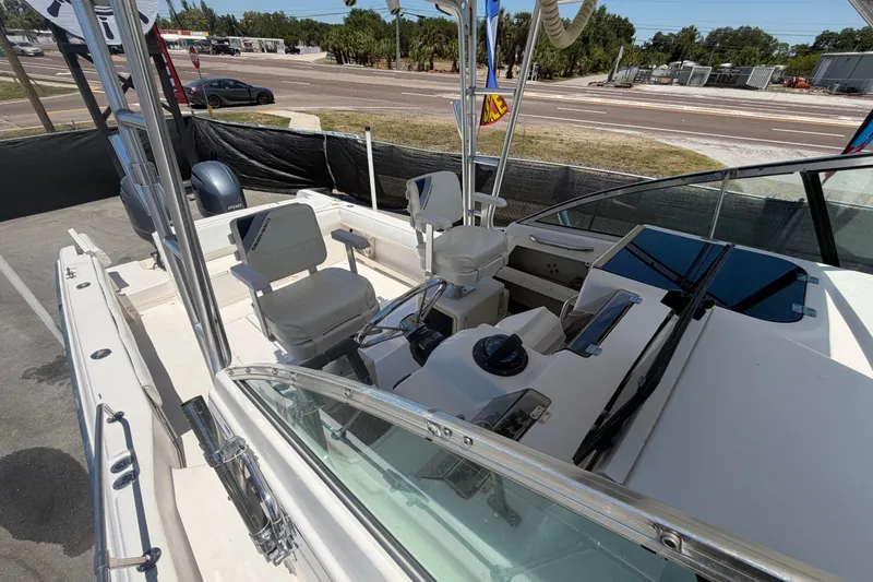 Slide: The Image of 1994 Grady-White Sailfish 272 boat interior with helm, seating, and controls. - 96