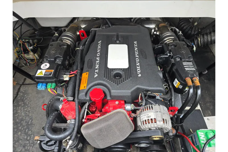Slide: The Image of Volvo Penta engine in a 2003 Cobalt 262 boat, showcasing detailed components. - 15
