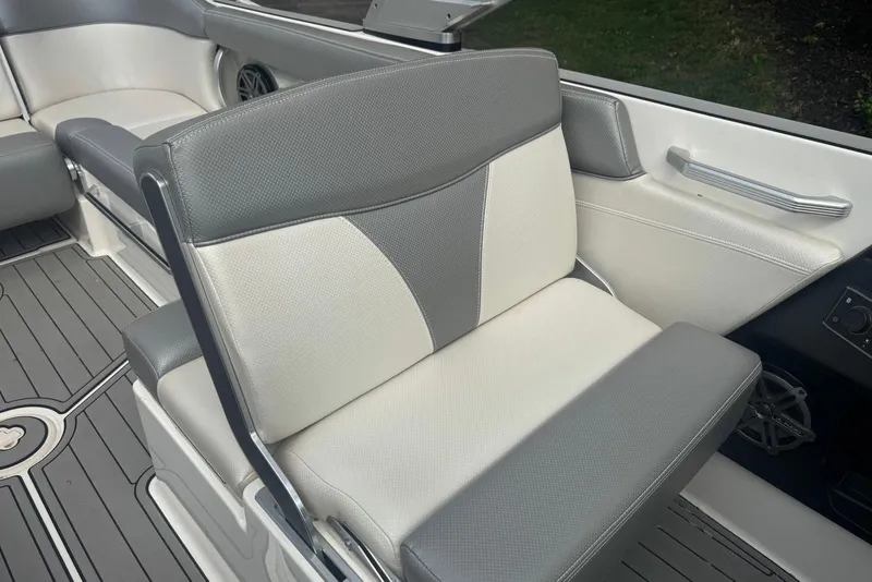Slide: The Image of 2017 MasterCraft X26 interior seating with gray and white upholstery. - 9