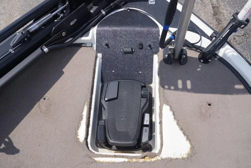 Slide: The Image of 2004 Triton Tr-196 DC boat foot pedal and control panel close-up. - 11
