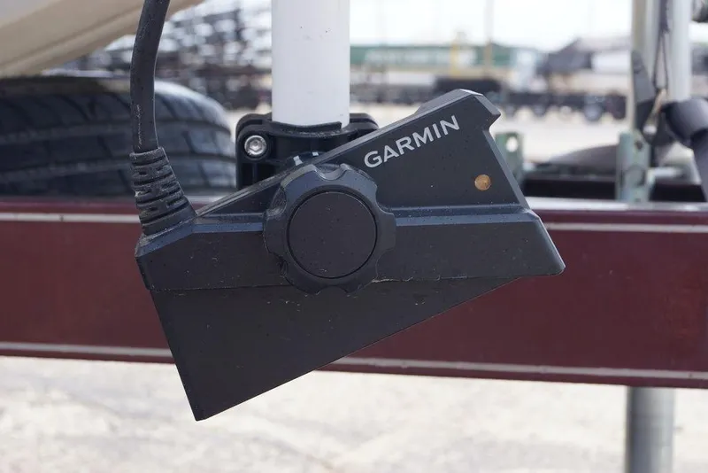 Slide: The Image of Garmin device mounted on a 2004 Triton Tr-196 DC boat trailer. - 17