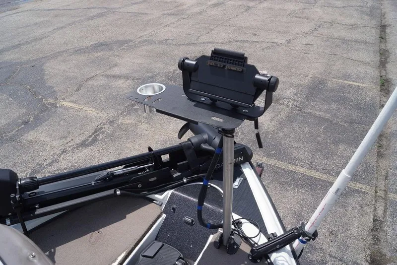 Slide: The Image of 2004 Triton Tr-196 DC boat with mounted Garmin equipment and cup holder on deck. - 4