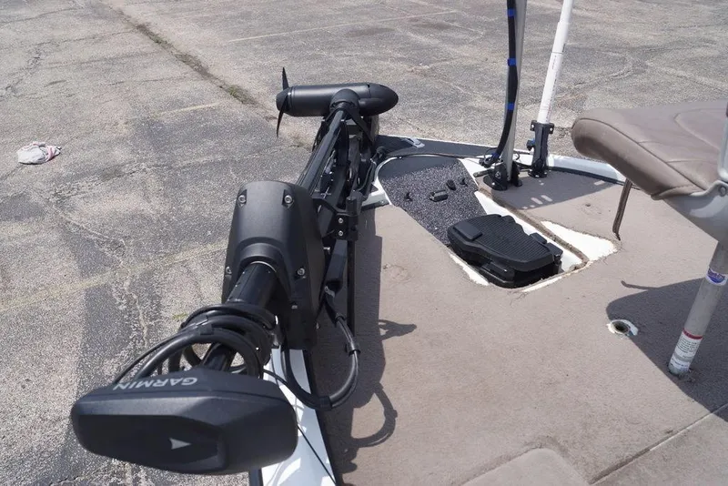 Slide: The Image of 2004 Triton Tr-196 DC boat deck with Garmin trolling motor and foot pedal. - 5