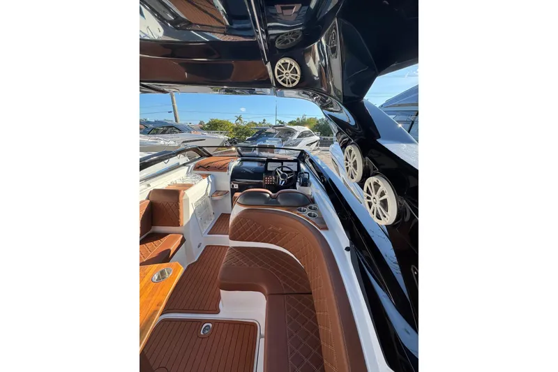 Slide: The Image of Luxurious interior of 2025 NX Boats NX290 Exclusive, featuring elegant seating and modern design. - 16