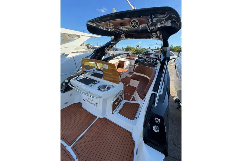 Slide: The Image of 2025 NX Boats NX290 Exclusive luxury boat interior with sleek design and modern amenities. - 19