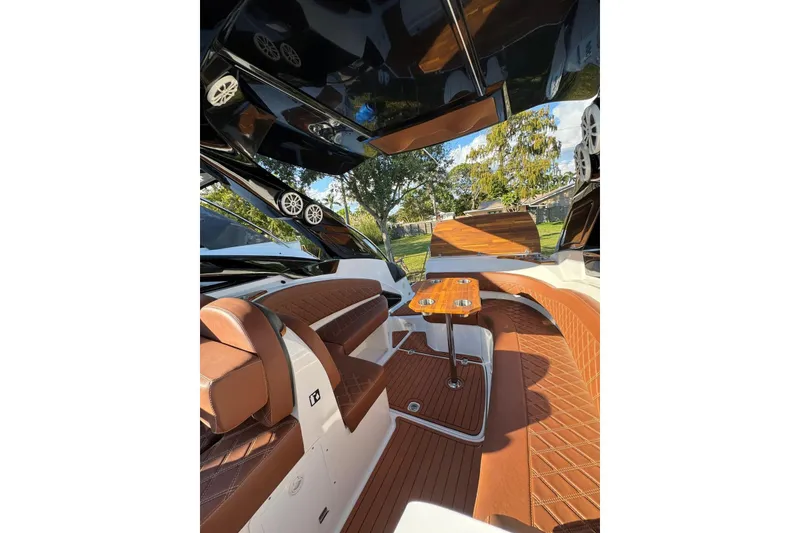 Slide: The Image of Luxurious interior of 2025 NX Boats NX290 Exclusive with elegant seating and modern design. - 20