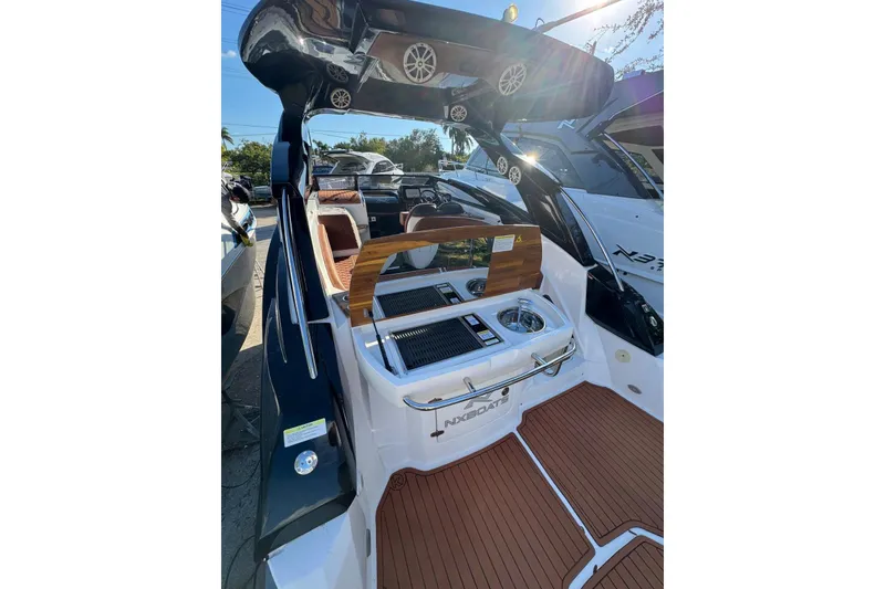 Slide: The Image of 2025 NX Boats NX290 Exclusive luxury yacht with sleek design and modern amenities. - 23
