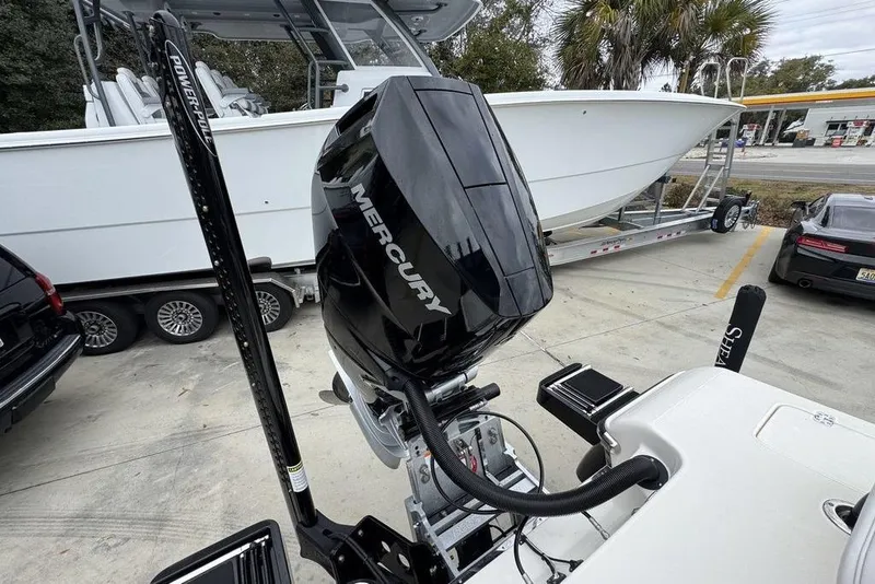 Slide: The Image of 2026 ShearWater 260 Carolina Flare boat with Mercury engine and Power-Pole, parked on trailer. - 40