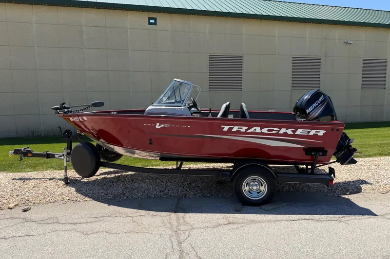 The Image of 2019 Tracker Pro Guide V-175 WT boat on trailer, parked outdoors. - 0