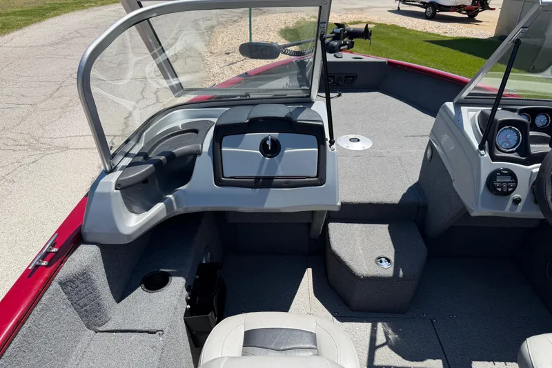 Slide: The Image of 2019 Tracker Pro Guide V-175 WT boat interior with steering console and seating. - 4