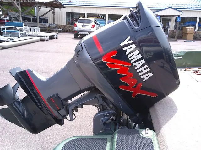 Slide: The Image of Yamaha Vmax outboard motor on a 2006 Stratos ST486F boat. - 9