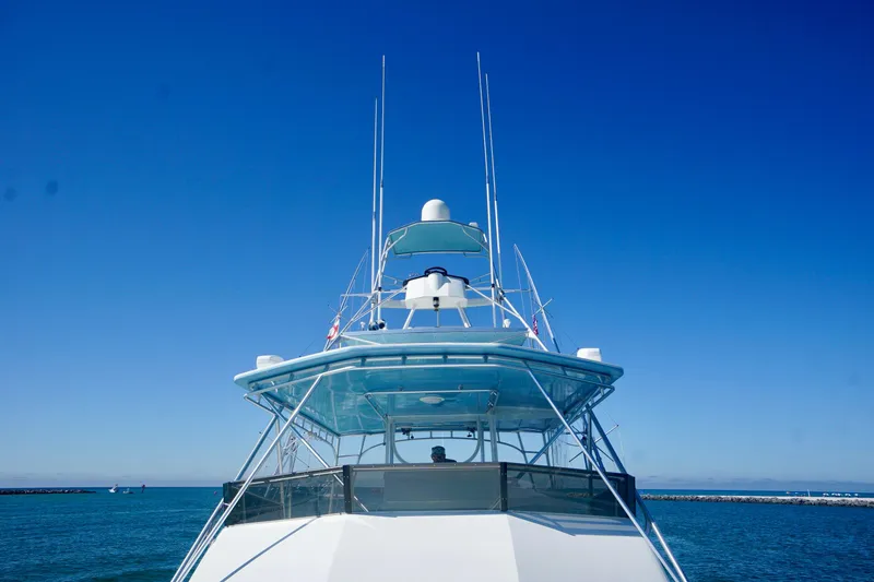 Slide: The Image of Front view of a 1991 G&S 58 yacht against a clear blue sky. - 20