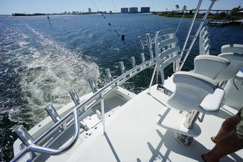 Slide: The Image of Luxury yacht deck with white chairs, ocean view, G&S 58 model, 1991. - 26